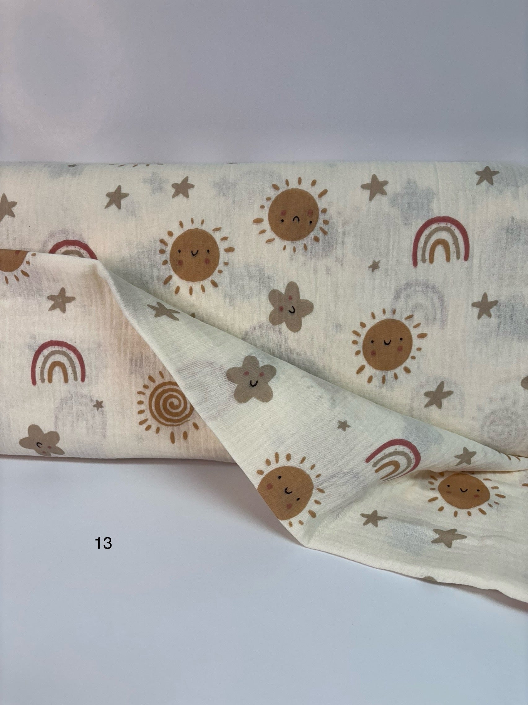 Double gaze (mousseline) motif ciel-ivoire